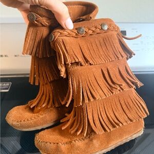 Minnetonka Kids Moccasins in Brown with Braided Fringe